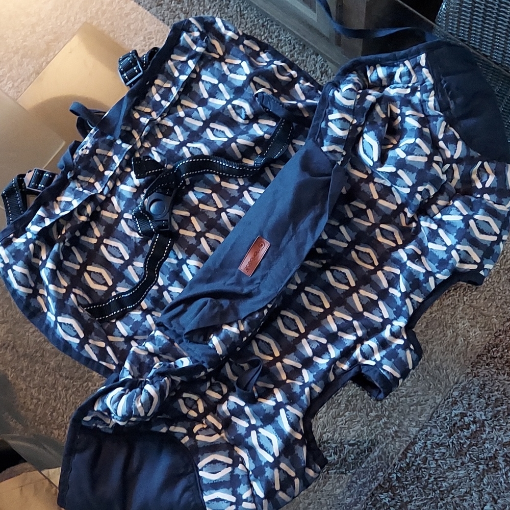 Baby shopping cart cover.
